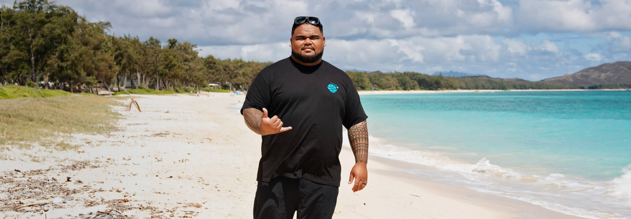 HIC Big Braddah Tee on the beach in Waimanalo