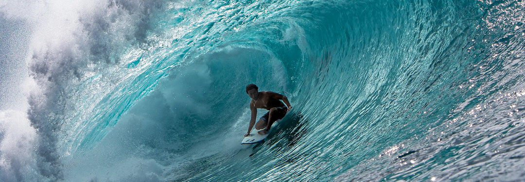 Josh Moniz rides deep in a Pipeline barrell
