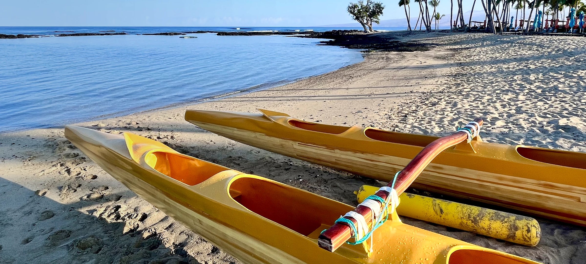A double-hulled canoe on Mauna Lani Beach