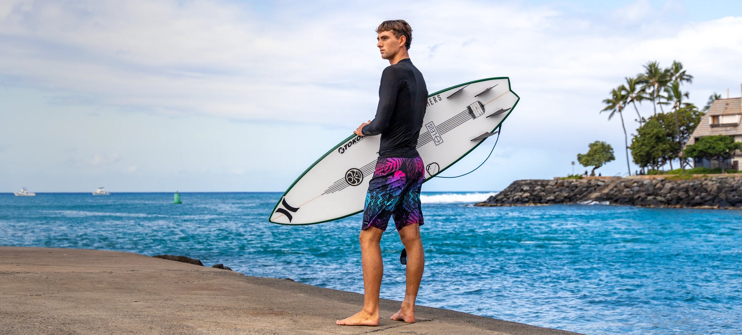 Luke Tema in Hurley boardshorts and lycra top.