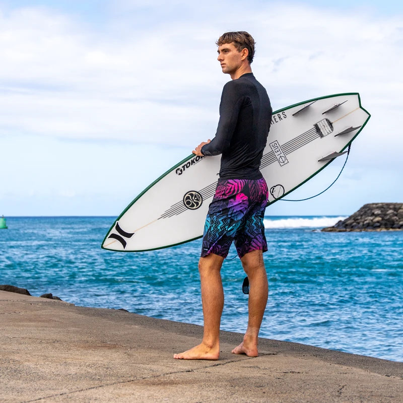 Luke Tema in Hurley boardshorts and lycra top.