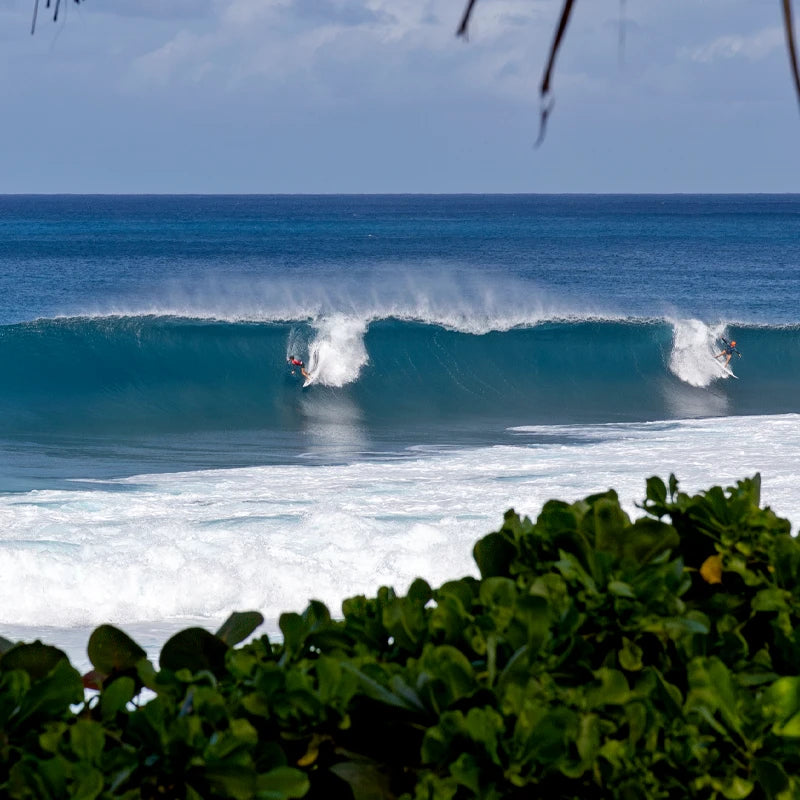 Contestants drop in at Pipeline during the 2024 Pipe Pro.