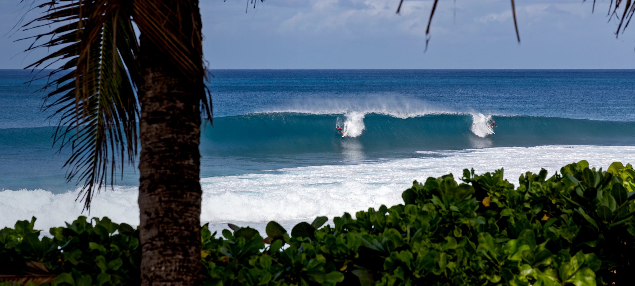 Contestants drop in at Pipeline during the 2024 Pipe Pro.