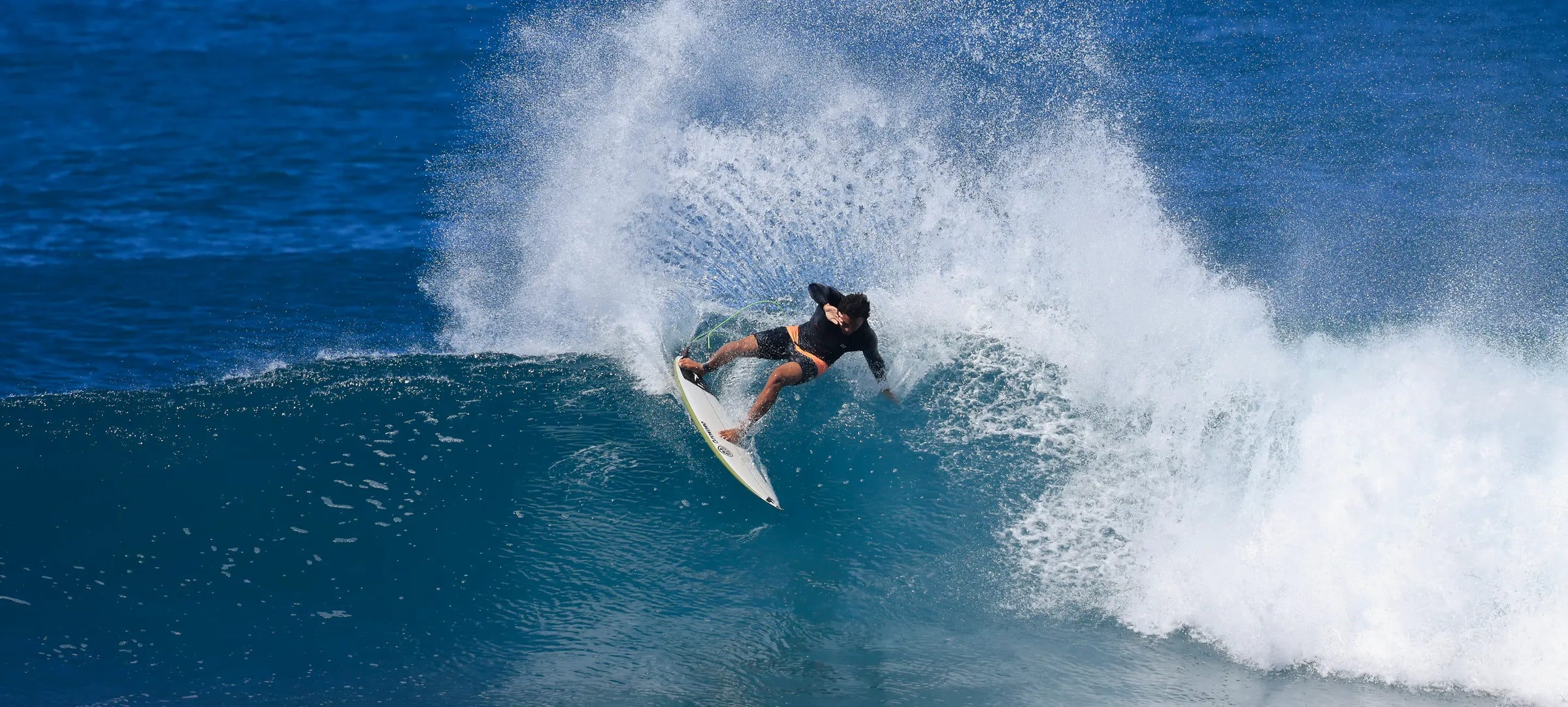 Pro surfer Josh Moniz carves a turn on a wave at Rocky Point, Hawaii